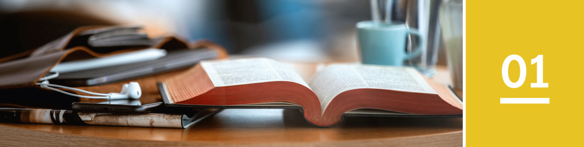 Image 1: An open Bible.