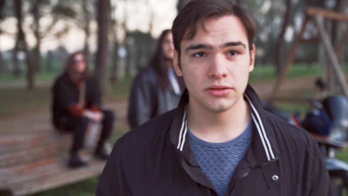 Image 4: A scene from the video ‘Rewarded for Persevering.’ Francesco walks away from his close friends after telling them that he would no longer associate with them.