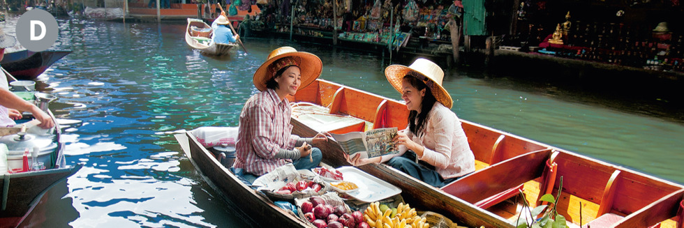 Image 5: D. A Witness preaching to a woman at a floating market in Thailand. D. Thailand