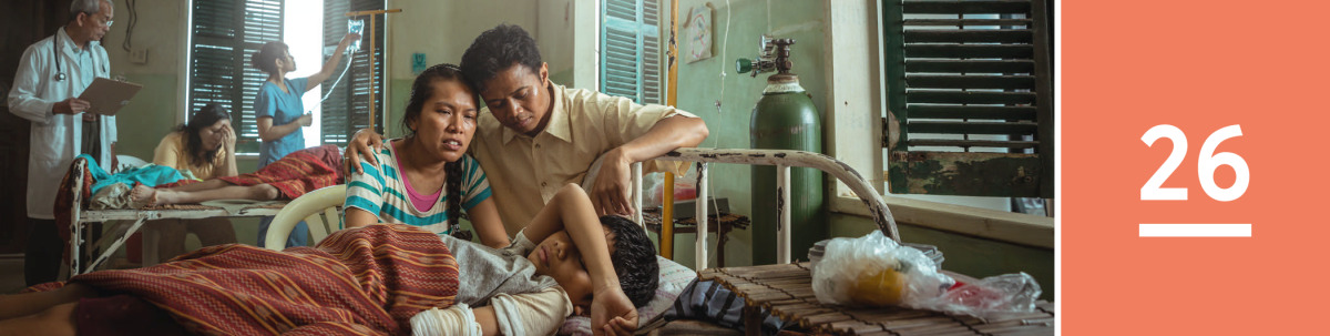 Image 1: Concerned parents sit next to their son lying in a hospital bed after something tragic happened to him.