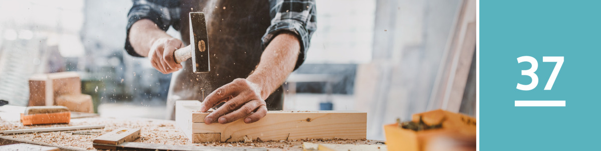 Image 1: A carpenter hammers a nail into wood.