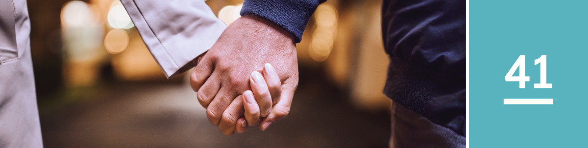 Image 1: A man and a woman hold hands.