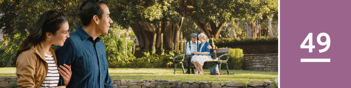 Image 1: A young married couple look at a happily married older couple.