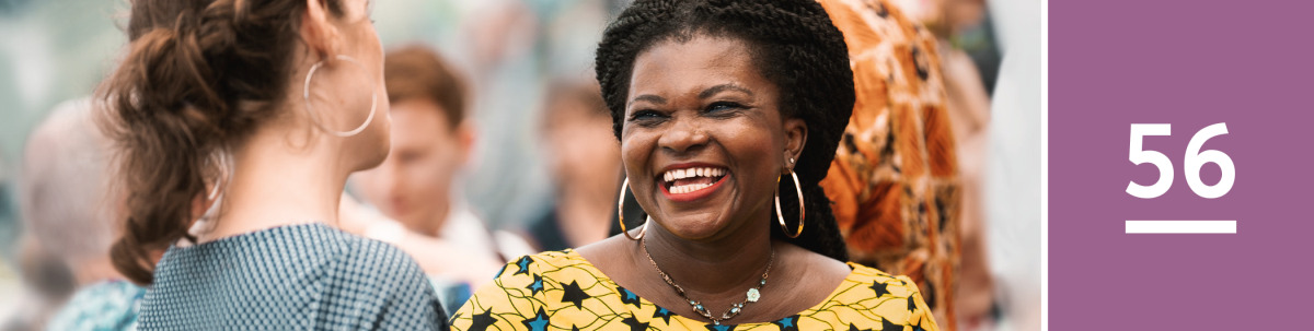 Image 1: Two sisters of different races happily greet each other.