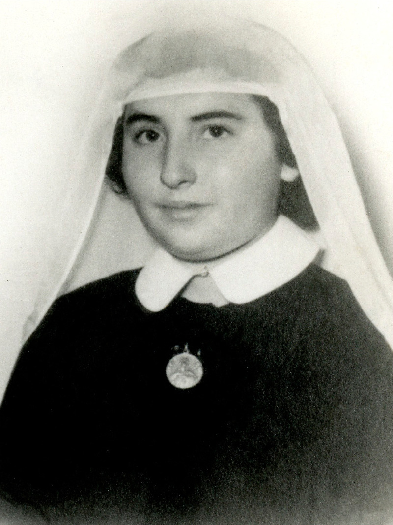 IMAGE 2 PICTURE DESCRIPTION: Isolina at the convent