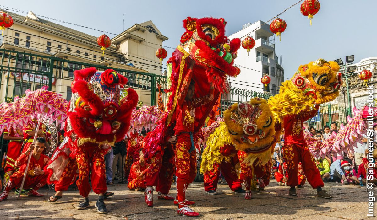 IMAGE 3 PICTURE DESCRIPTION: A Chinese New Year parade CAPTION: Chinese New Year